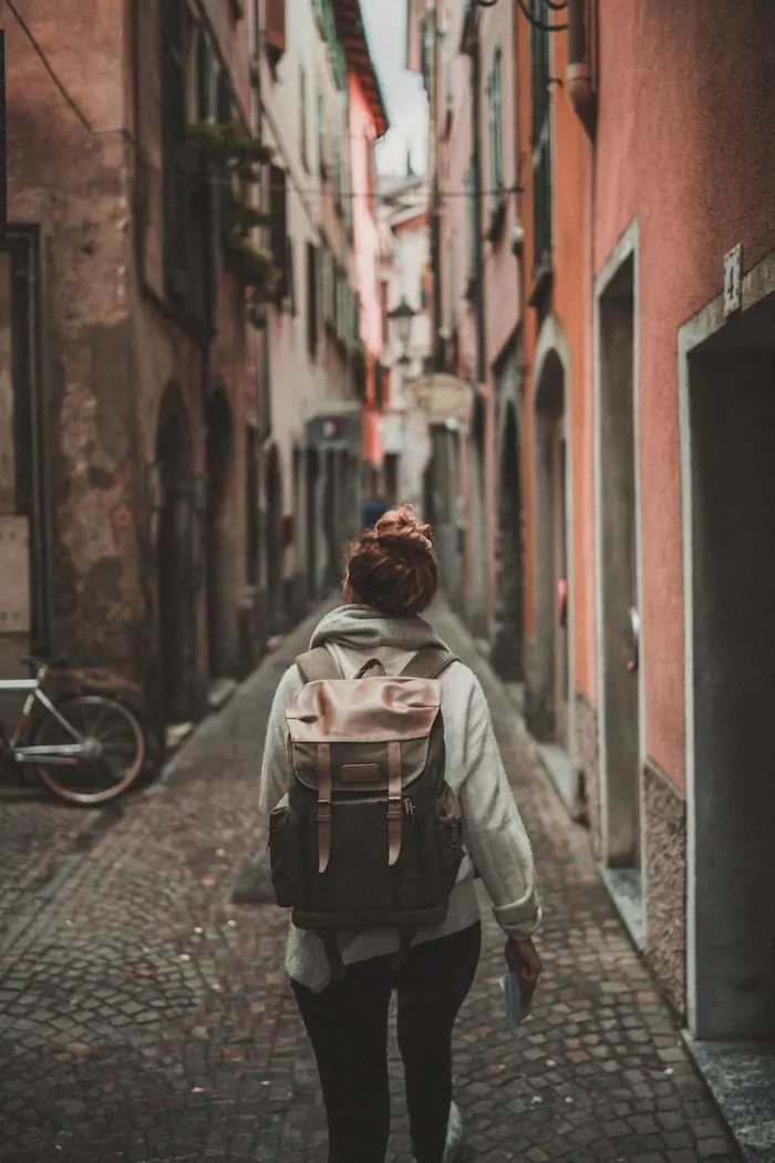 A traveller exploring an old-town alley